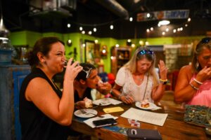 a group of women food tasting on a food tour