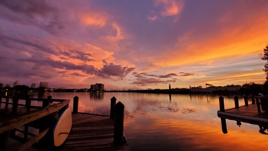 a sunset over a body of water
