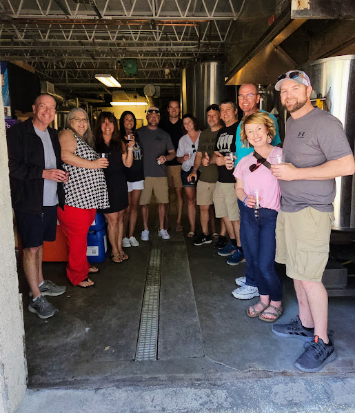 a group of people standing in front of a crowd